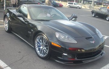 '09-'10_Chevrolet_Corvette_ZR1_(Orange_Julep_'10)_&_Pontiac_Montana_SV6.jpg